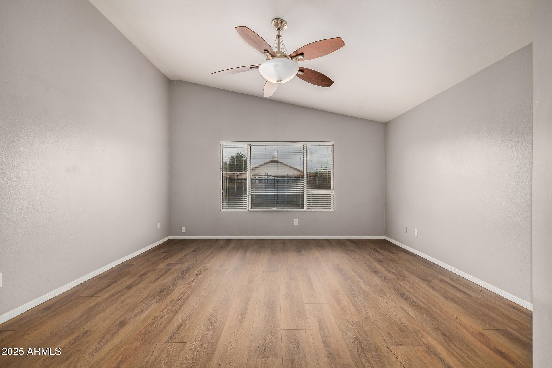 15002 South 47th Street Phoenix, AZ 85044 - Photo 21 of 41 wooden floor in an empty room with a window