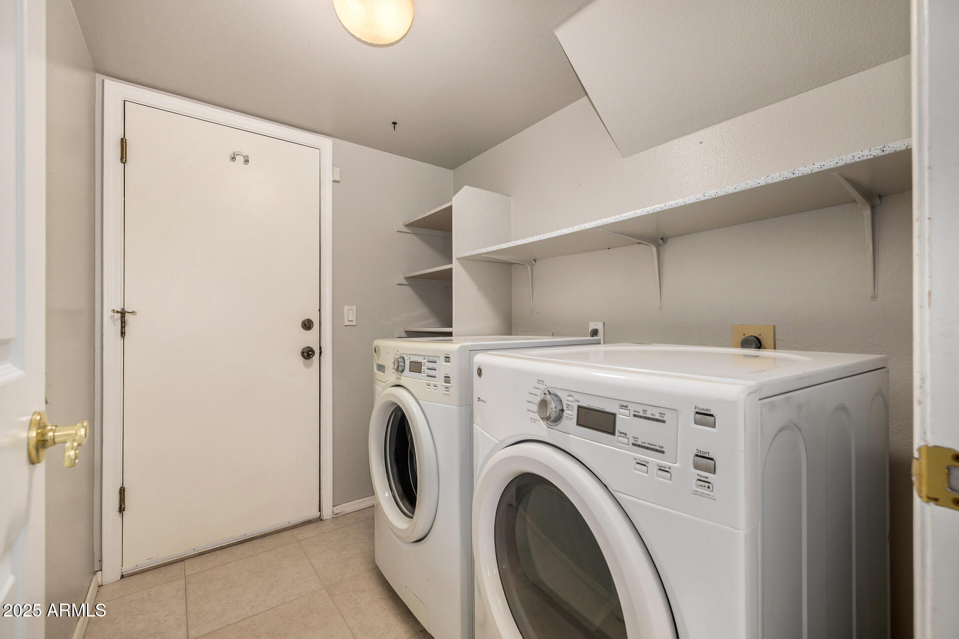 15002 South 47th Street Phoenix, AZ 85044 - Photo 35 of 41 a utility room with dryer and washer