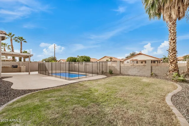 a bathroom with a sink and a yard