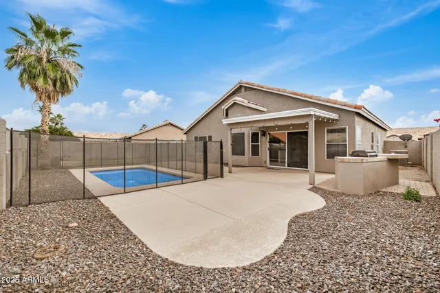 a view of a house with a swimming pool