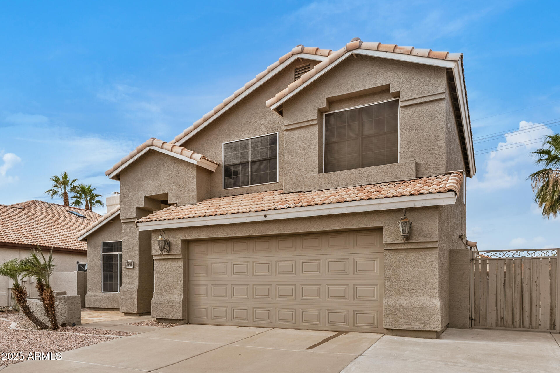 15002 South 47th Street Phoenix, AZ 85044 - Photo 4 of 41 a view of a house with a garage