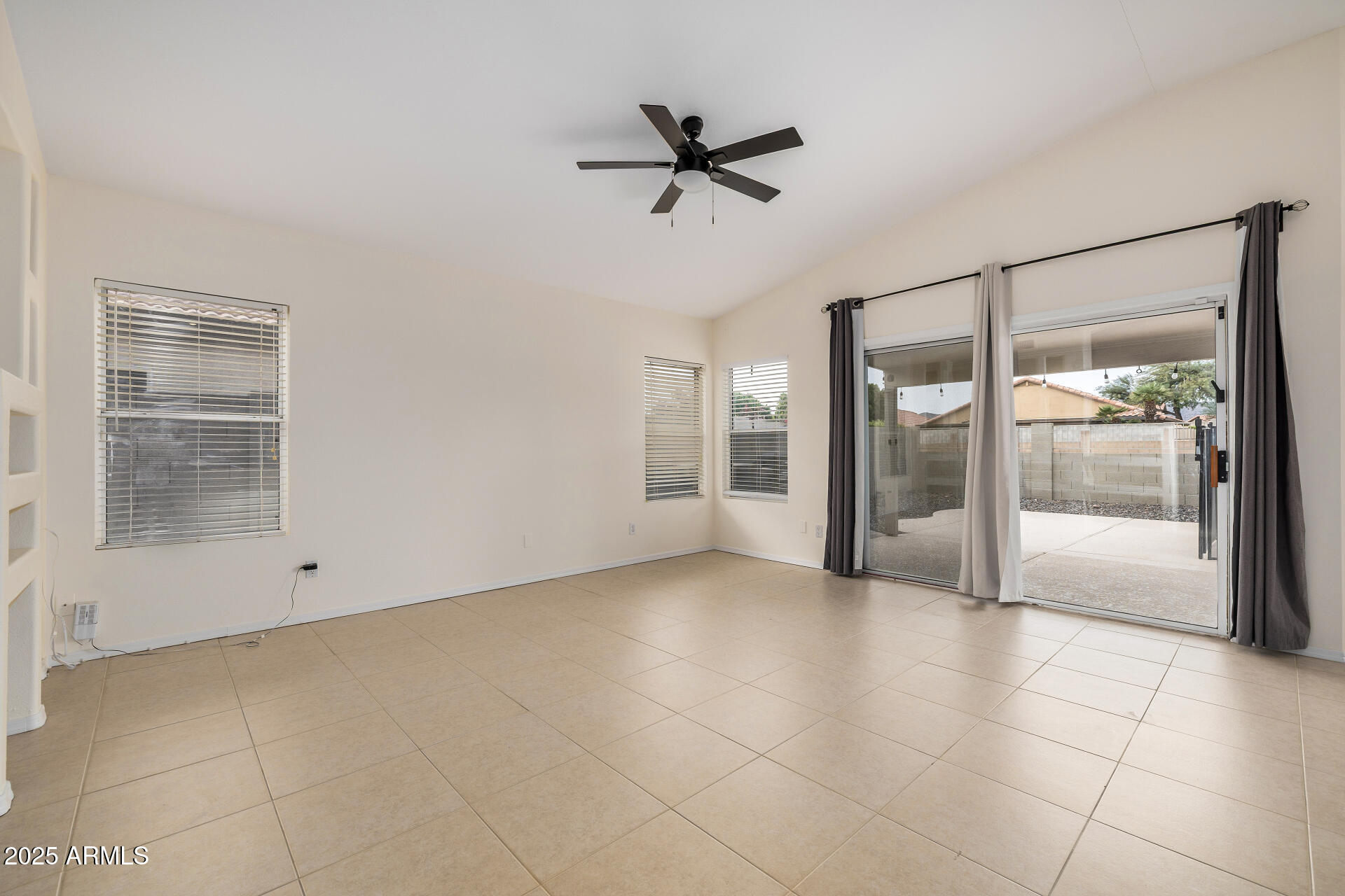 15002 South 47th Street Phoenix, AZ 85044 - Photo 10 of 41 a view of an empty room with a window