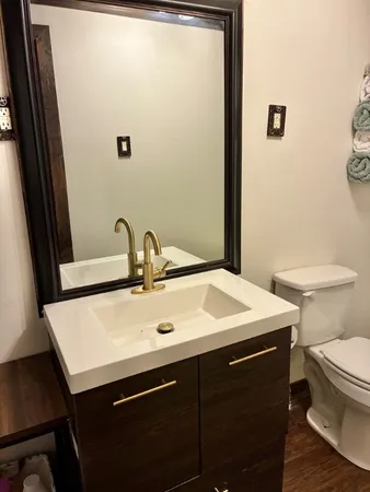 a bathroom with a sink and a toilet