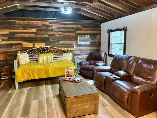 a bed room with a bed and a couch