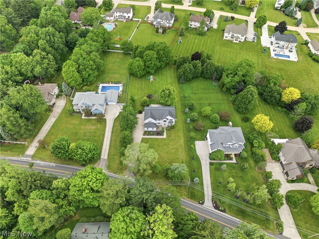 11678 Dunham Road Northfield, OH 44067 - Photo 37 of 38 Aerial perspective showcasing multiple properties with expansive green lawns