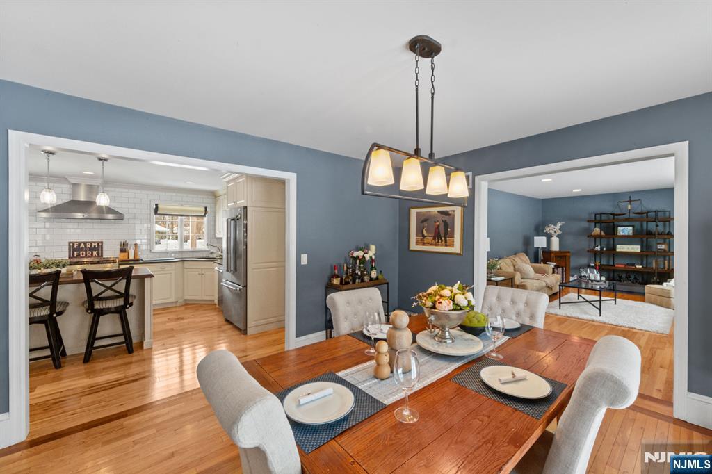 2 Overbrook Place Hillsdale, NJ 07642 - Photo 12 of 49 a living room with furniture dining table and wooden floor