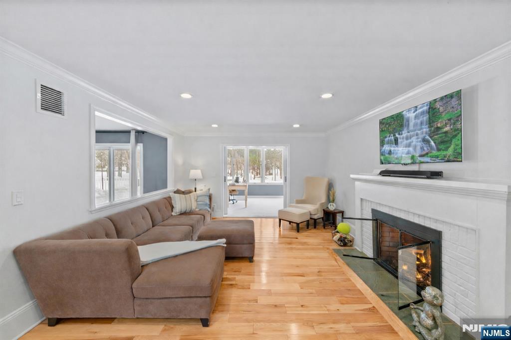 2 Overbrook Place Hillsdale, NJ 07642 - Photo 15 of 49 a living room with furniture and a fireplace