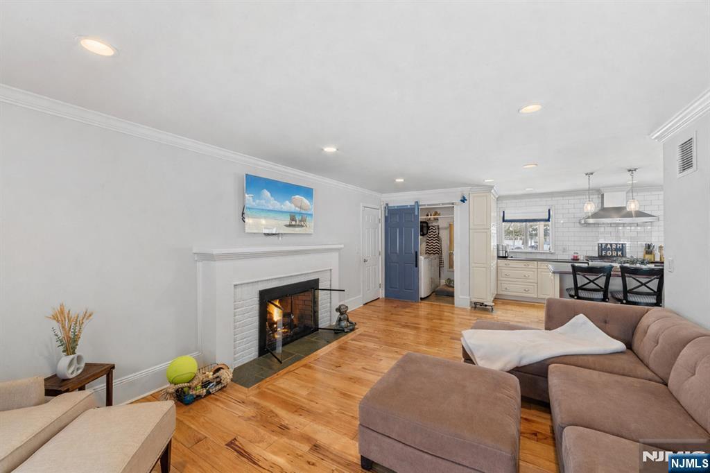 2 Overbrook Place Hillsdale, NJ 07642 - Photo 17 of 49 a large bedroom with a bed and a fireplace