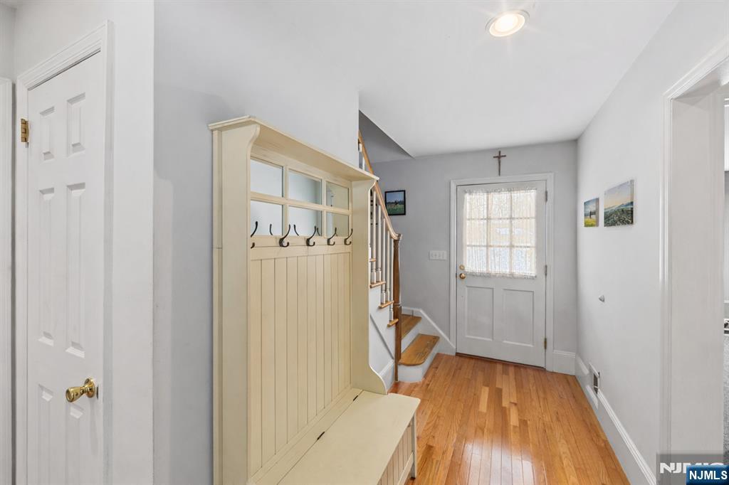 2 Overbrook Place Hillsdale, NJ 07642 - Photo 23 of 49 a view of a livingroom with wooden floor and a window