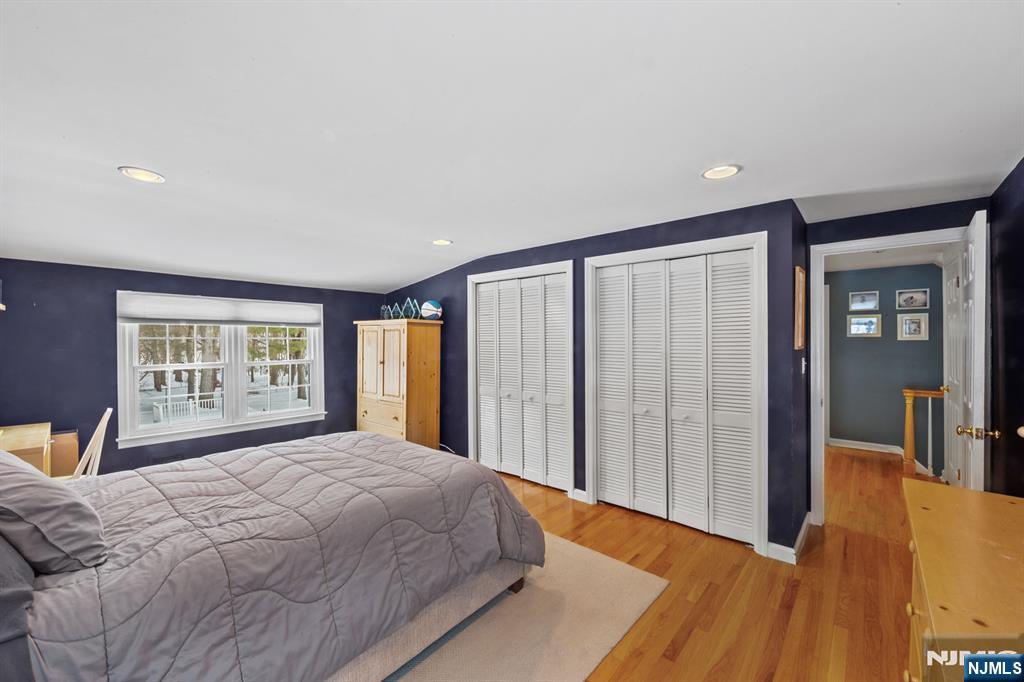 2 Overbrook Place Hillsdale, NJ 07642 - Photo 24 of 49 a bedroom with a large bed and a window