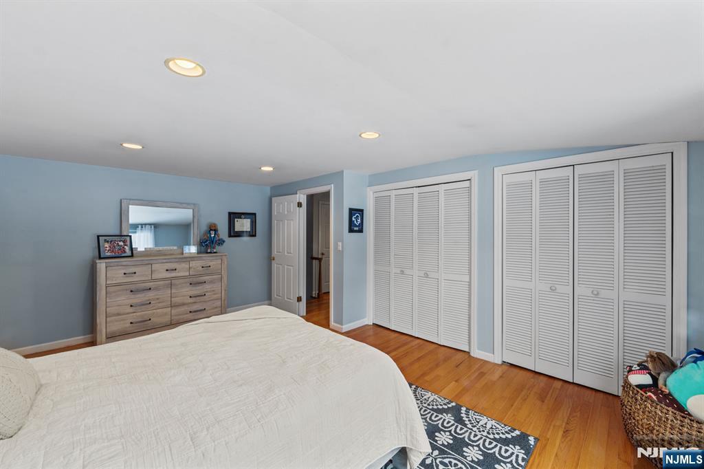 2 Overbrook Place Hillsdale, NJ 07642 - Photo 29 of 49 a bedroom with a bed and a dresser