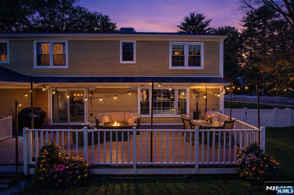 2 Overbrook Place Hillsdale, NJ 07642 - Photo 3 of 49 a view of a house with wooden deck and furniture