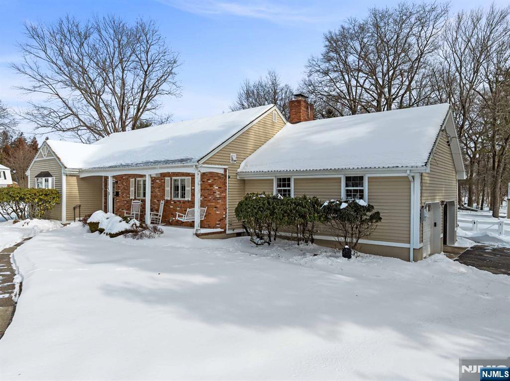 2 Overbrook Place Hillsdale, NJ 07642 - Photo 42 of 49 a view of a house with backyard porch and sitting area