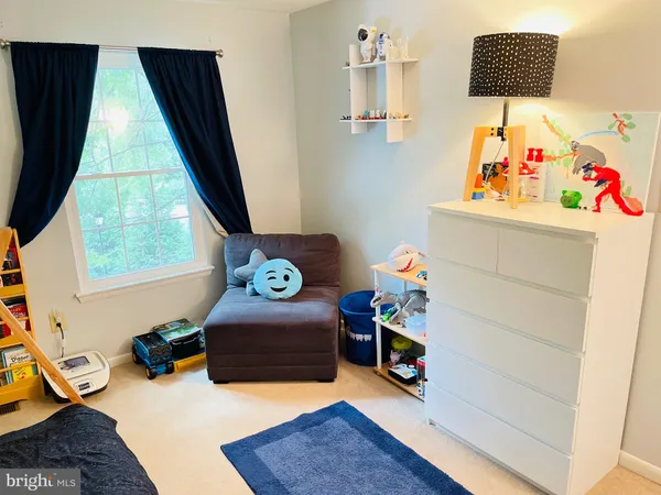 a room with furniture and a window