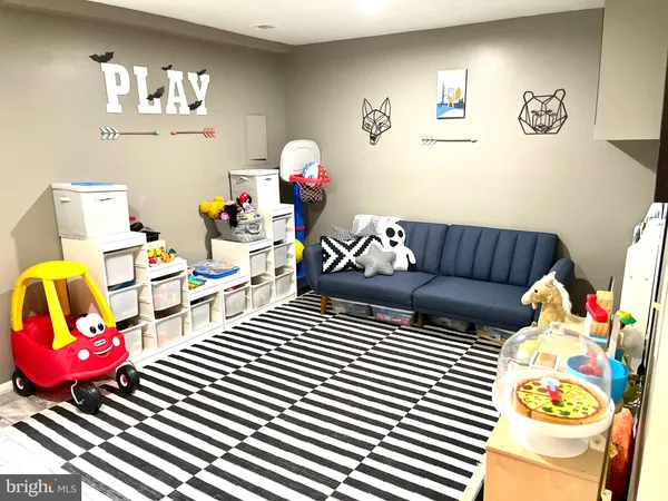 a living room with furniture and a couch
