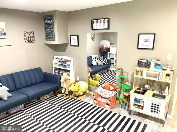 a living room filled with furniture and furniture