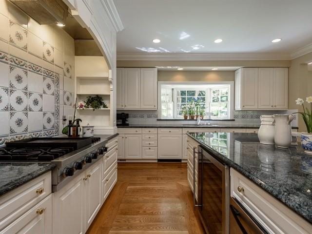 24 Edge Road Atherton, CA 94027 - Photo 13 of 34 a kitchen with stainless steel appliances granite countertop a sink stove and cabinets