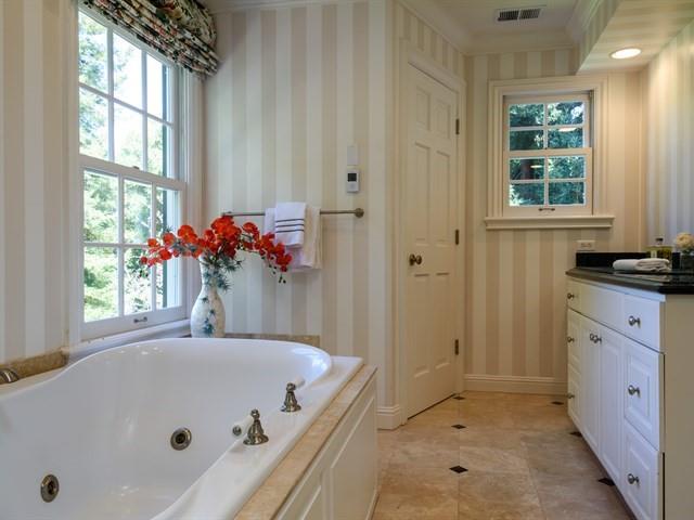24 Edge Road Atherton, CA 94027 - Photo 20 of 34 a bathroom with a tub and a shower