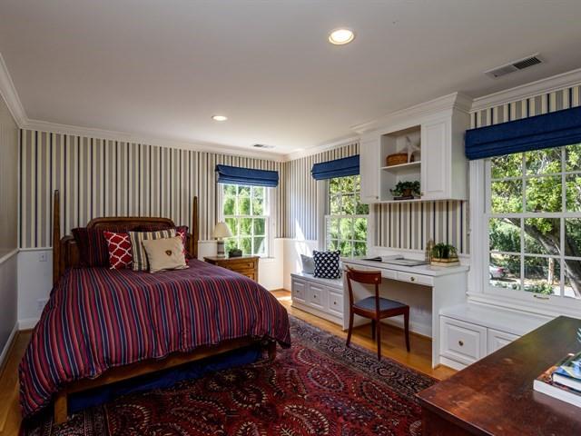 24 Edge Road Atherton, CA 94027 - Photo 21 of 34 a bedroom with a bed and windows