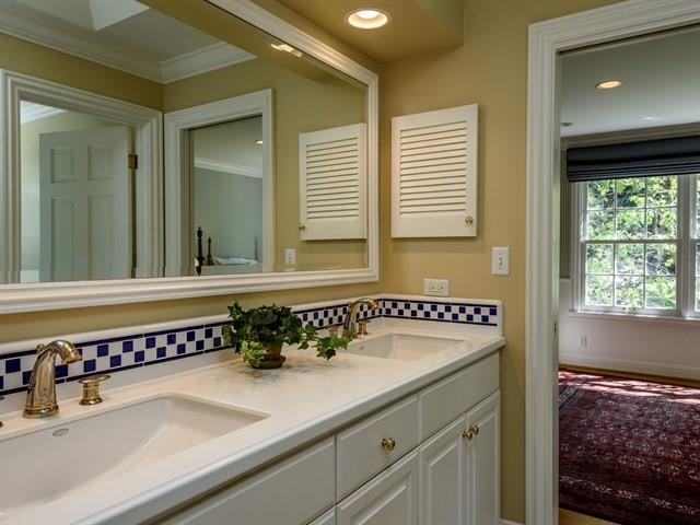 24 Edge Road Atherton, CA 94027 - Photo 22 of 34 a bathroom with a sink and a mirror