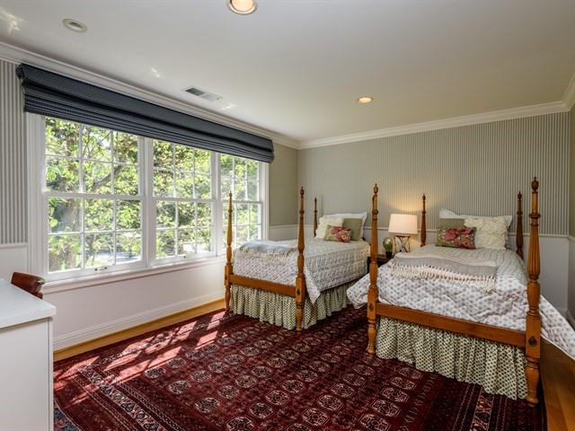 24 Edge Road Atherton, CA 94027 - Photo 23 of 34 a bedroom with a bed and wooden floor