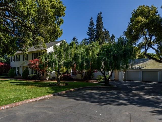 24 Edge Road Atherton, CA 94027 - Photo 3 of 34 a front view of a house with a yard