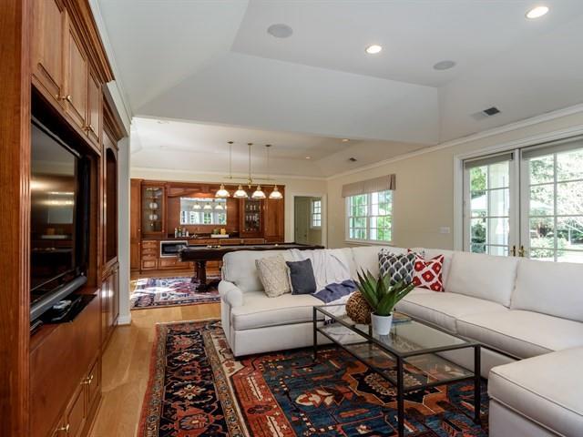 24 Edge Road Atherton, CA 94027 - Photo 31 of 34 a living room with furniture and a flat screen tv