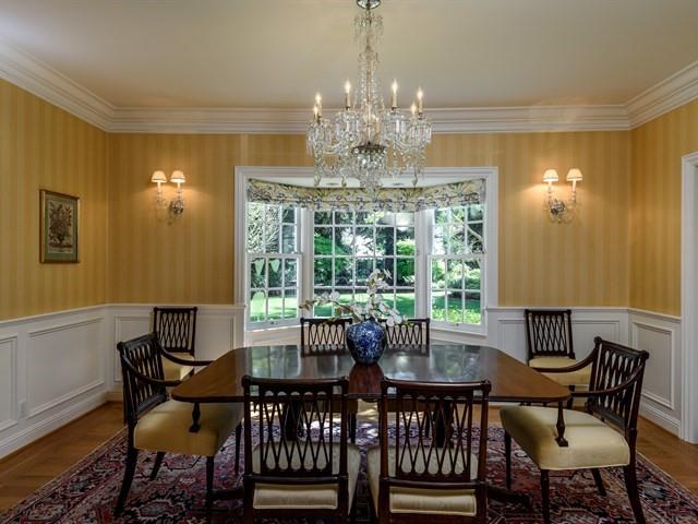 24 Edge Road Atherton, CA 94027 - Photo 6 of 34 a view of a dining room with furniture a chandelier and wooden floor