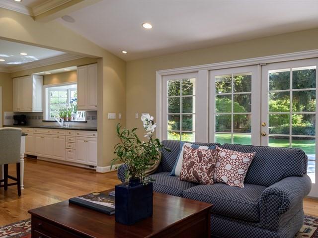 24 Edge Road Atherton, CA 94027 - Photo 9 of 34 a living room with furniture potted plant and a large window