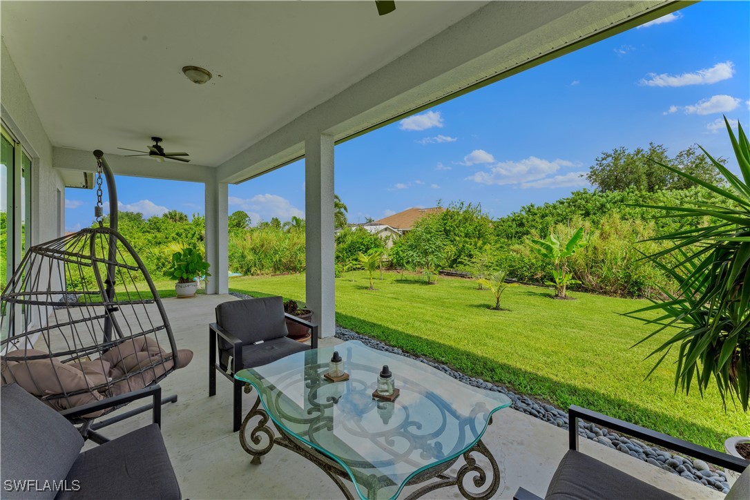 3002 42nd Street Southwest Lehigh Acres, FL 33976 - Photo 19 of 25 a view of swimming pool from a balcony