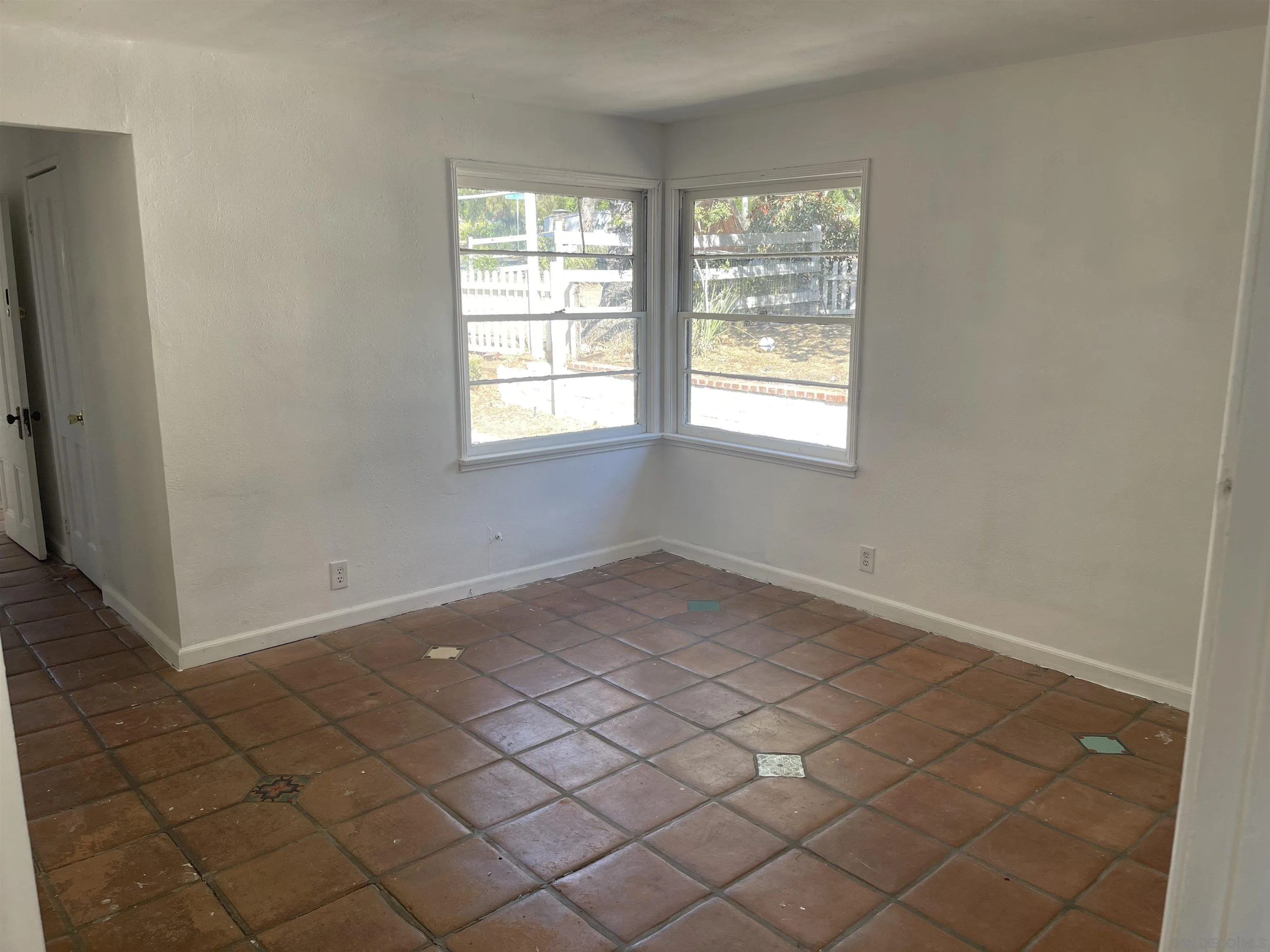 1367 Green Canyon Road Fallbrook, CA 92028 - Photo 12 of 42 an empty room with windows