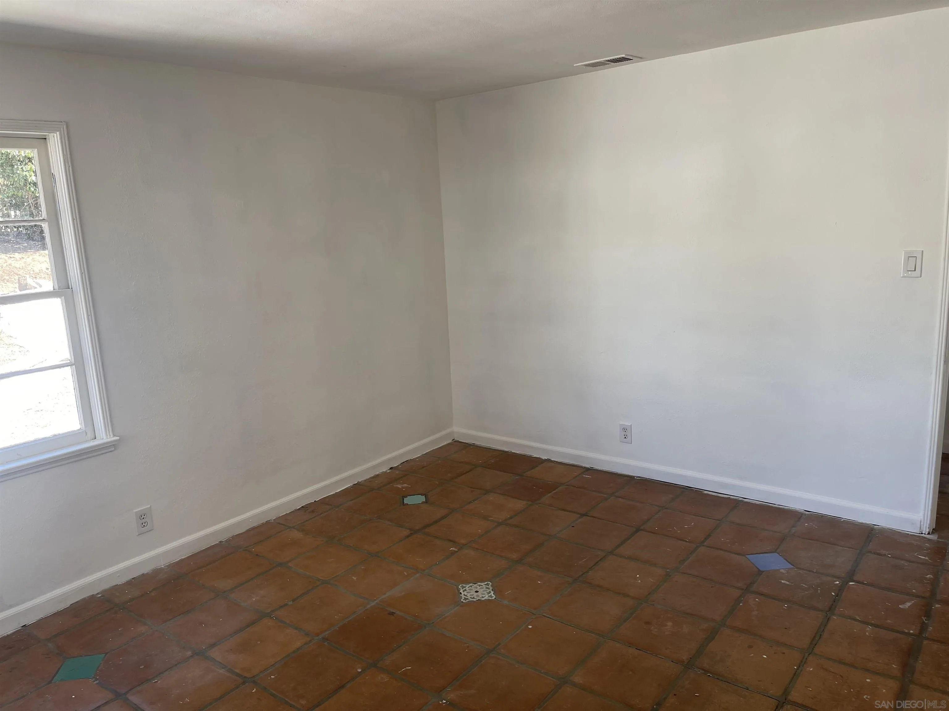1367 Green Canyon Road Fallbrook, CA 92028 - Photo 13 of 42 an empty room with a window