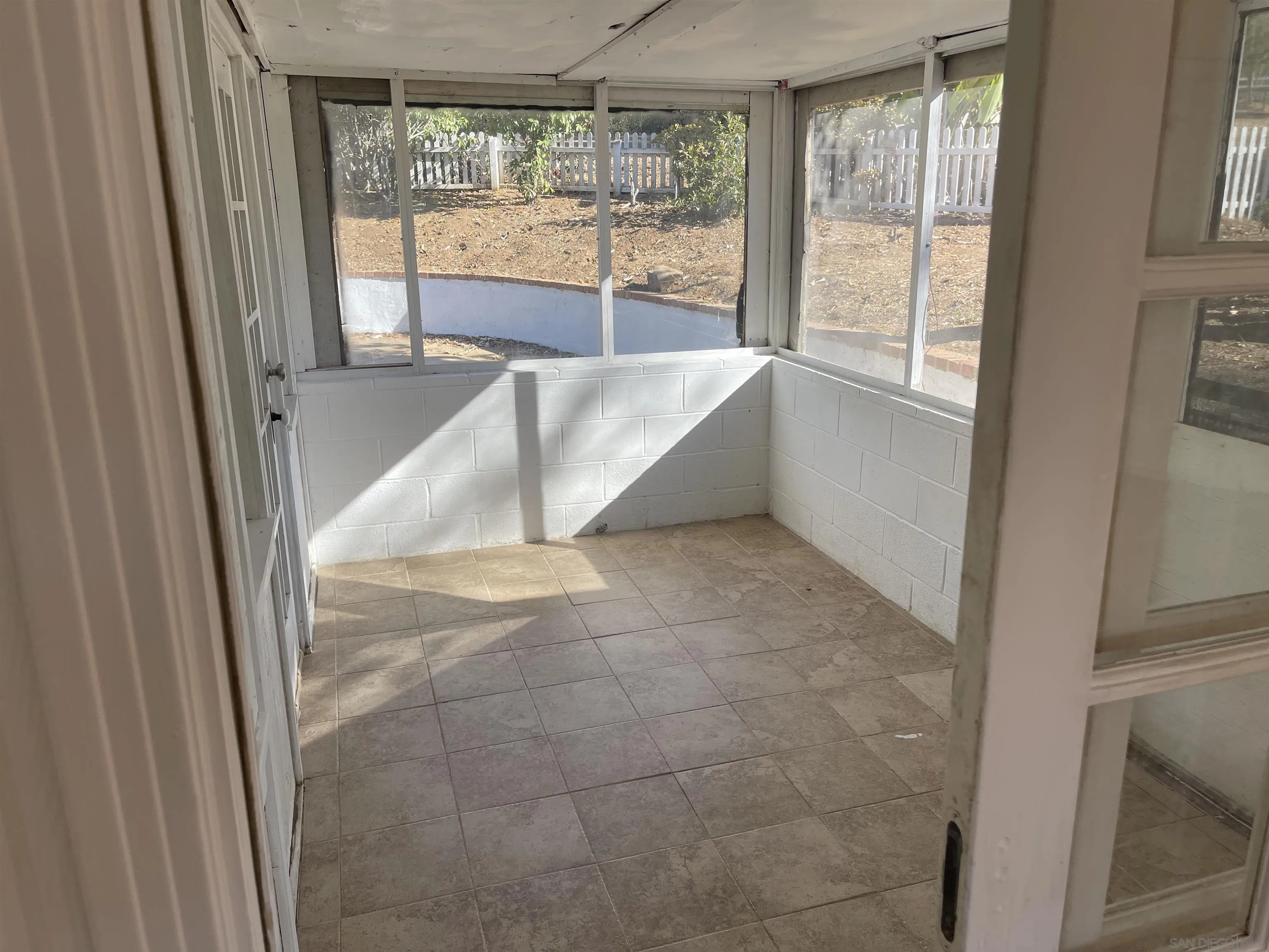 1367 Green Canyon Road Fallbrook, CA 92028 - Photo 16 of 42 a view of an empty room and window