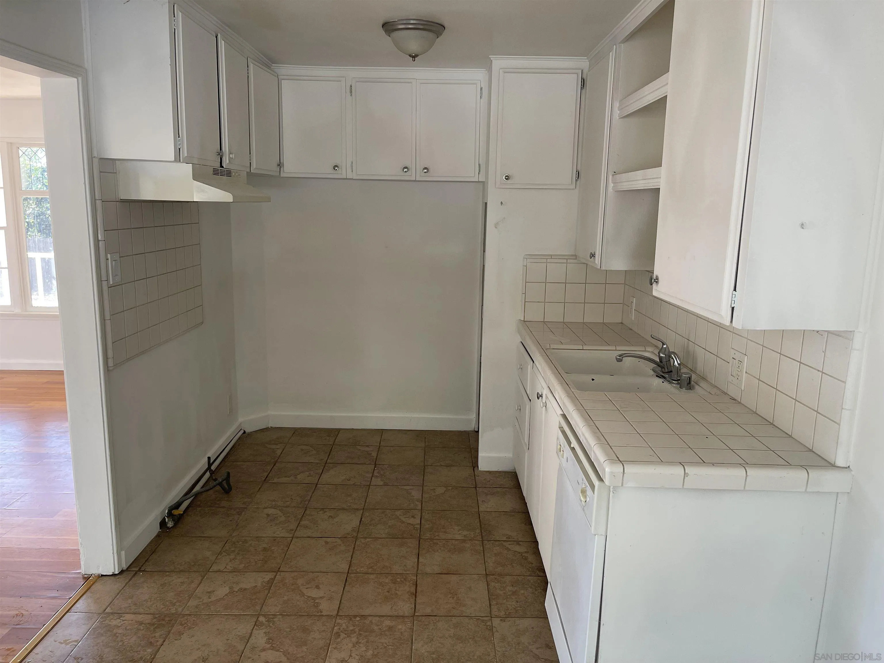 1367 Green Canyon Road Fallbrook, CA 92028 - Photo 19 of 42 a bathroom with a sink and a washing machine