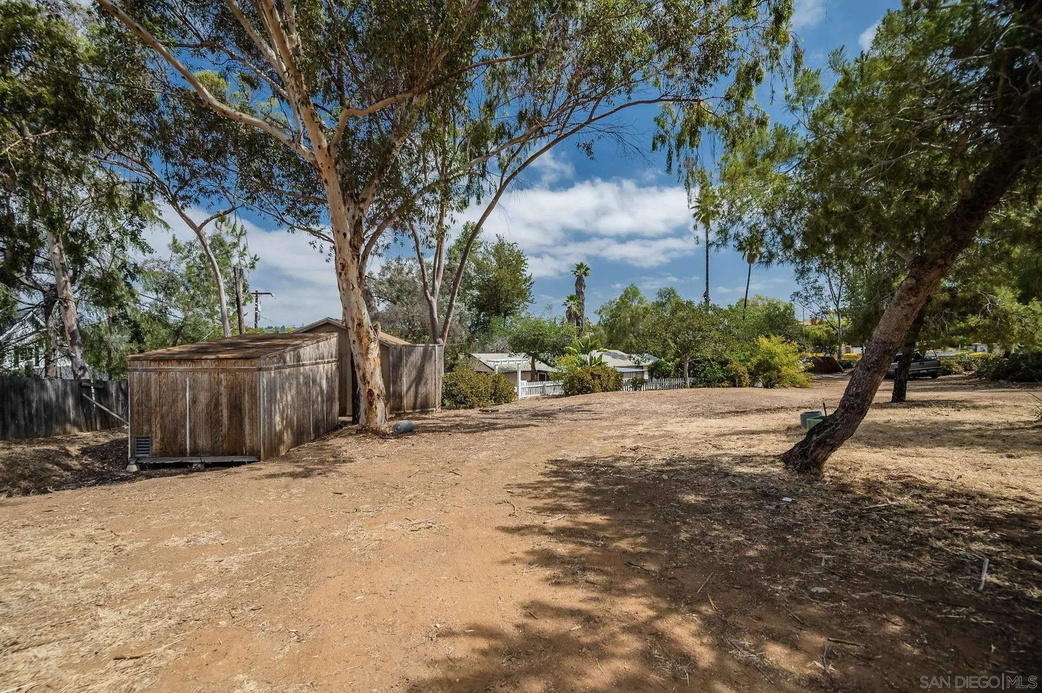 1367 Green Canyon Road Fallbrook, CA 92028 - Photo 20 of 42 a view of a backyard of the house