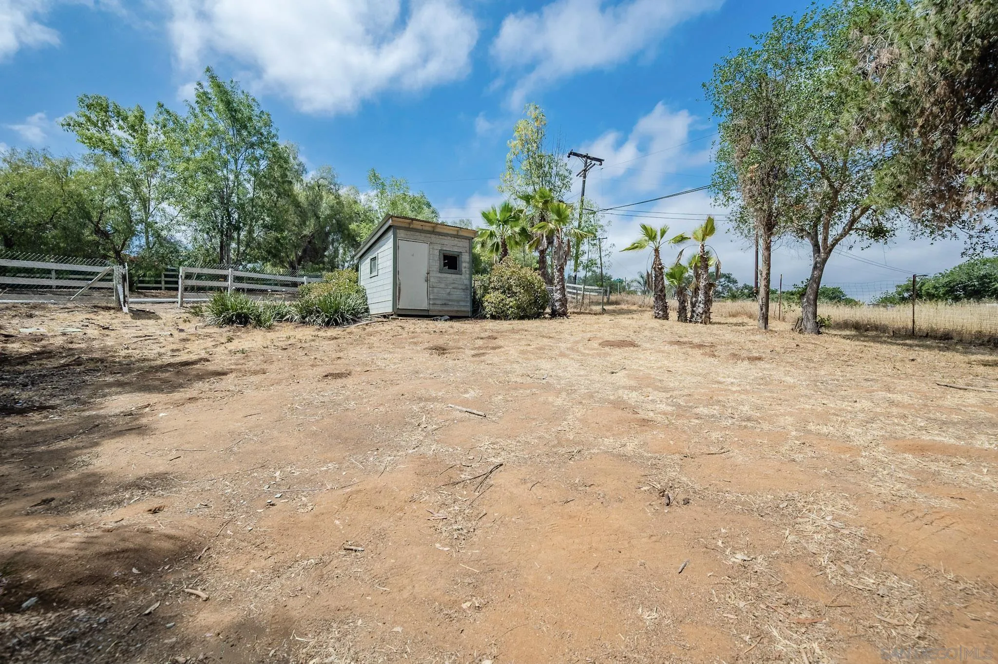 1367 Green Canyon Road Fallbrook, CA 92028 - Photo 21 of 42 a pathway of a house with a yard