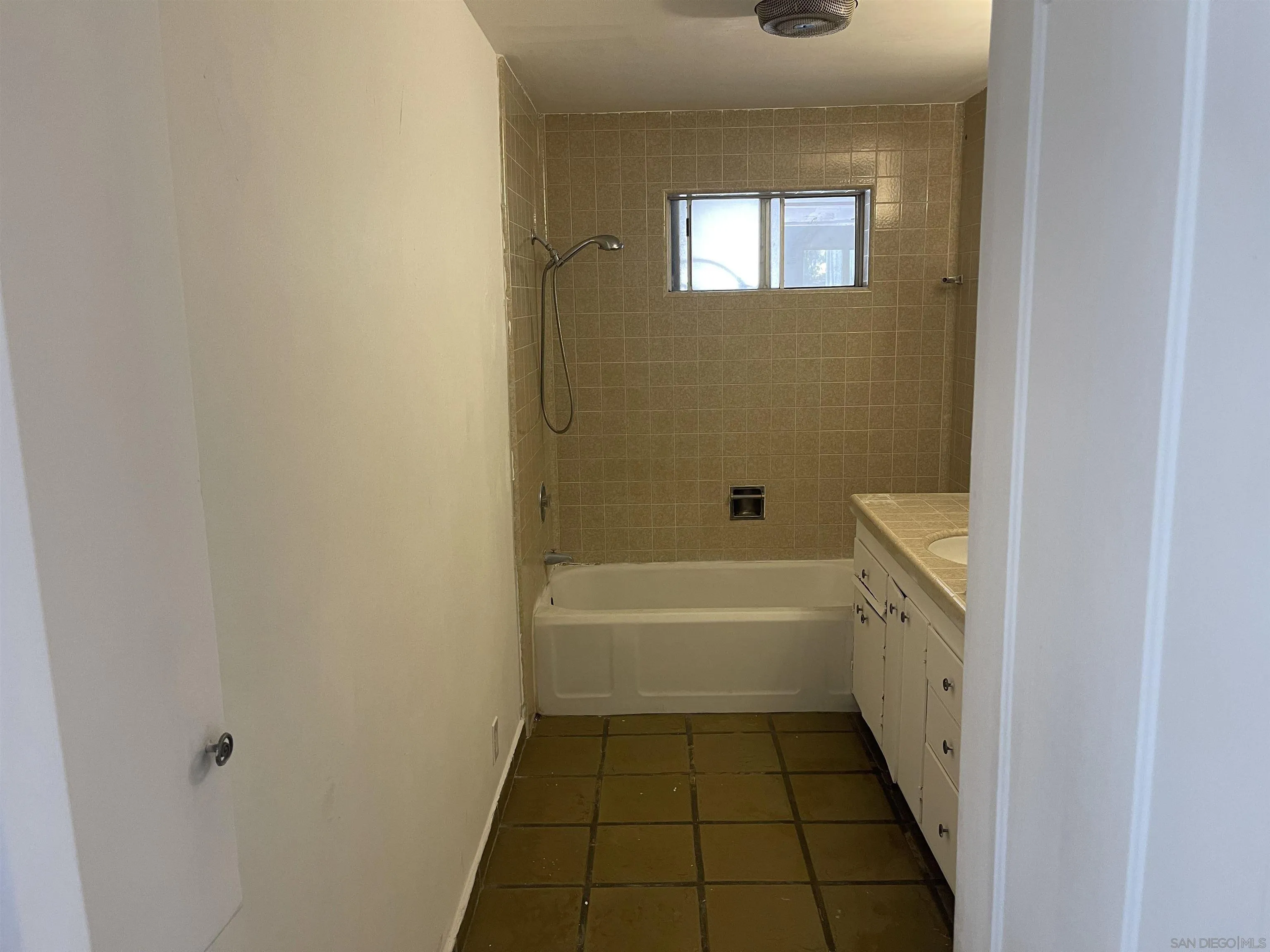 1367 Green Canyon Road Fallbrook, CA 92028 - Photo 6 of 42 a bathroom with a bathtub and a shower