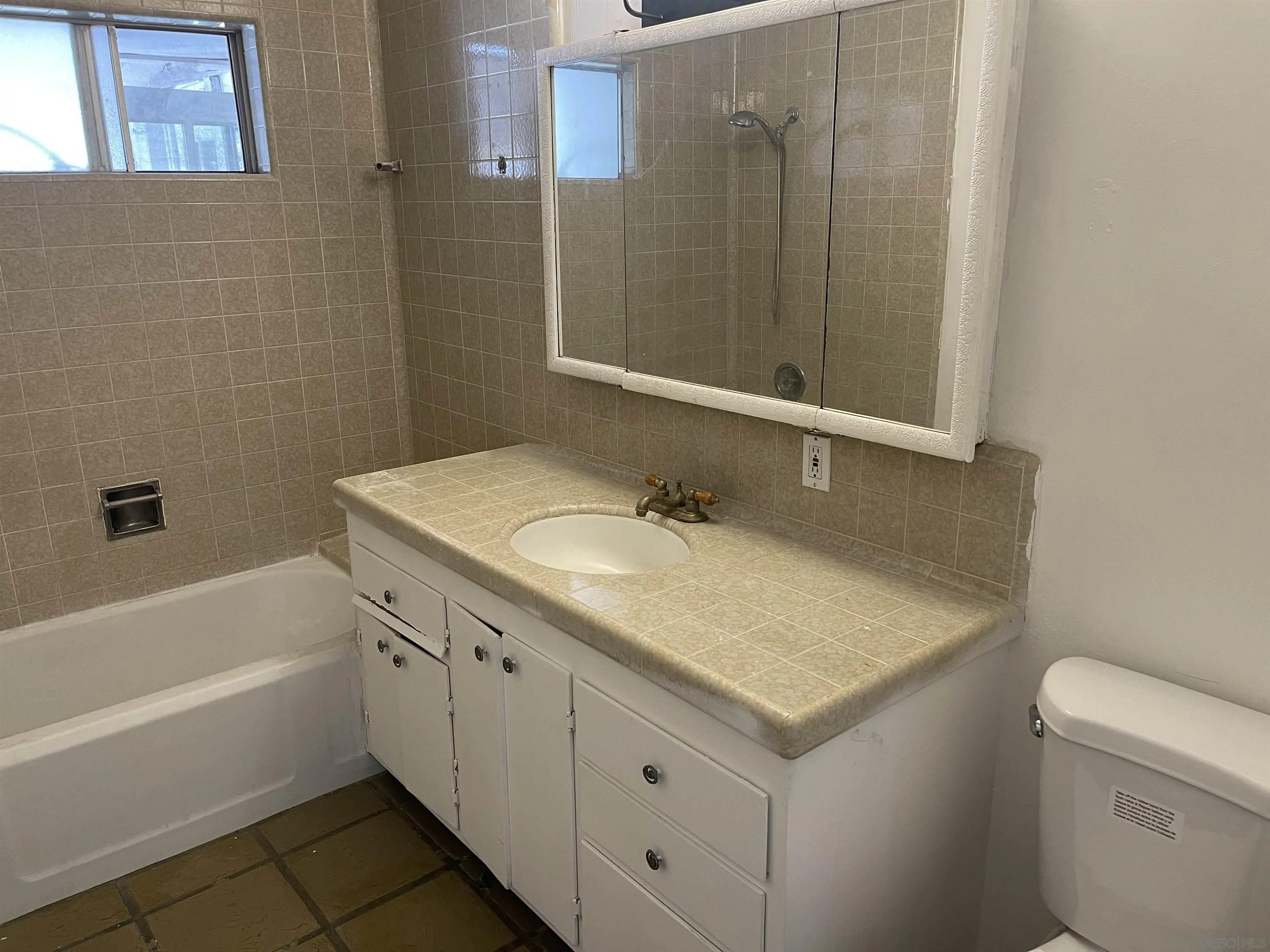 1367 Green Canyon Road Fallbrook, CA 92028 - Photo 7 of 42 a bathroom with a granite countertop sink and a mirror