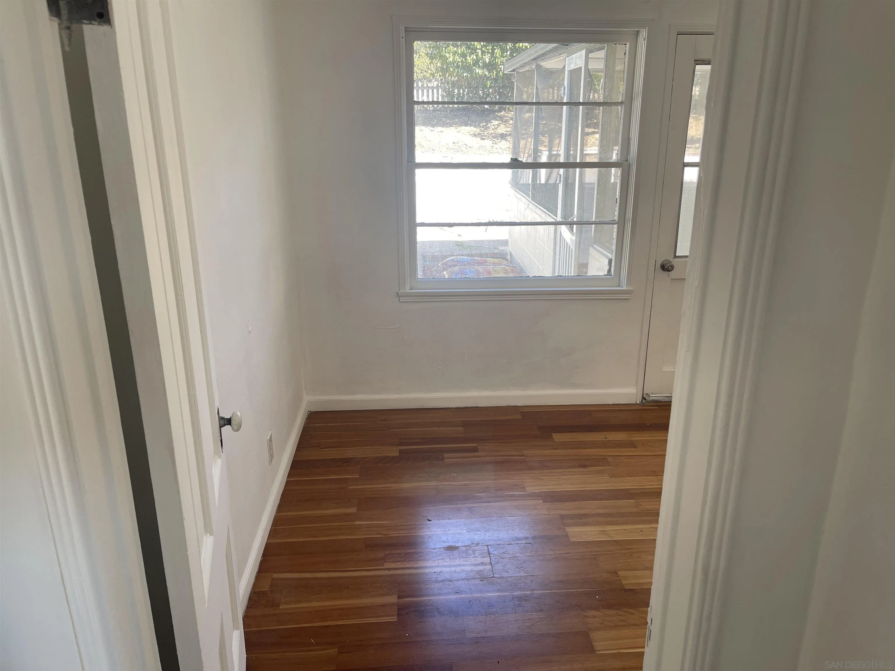 1367 Green Canyon Road Fallbrook, CA 92028 - Photo 10 of 42 a view of a small space with wooden floor and window