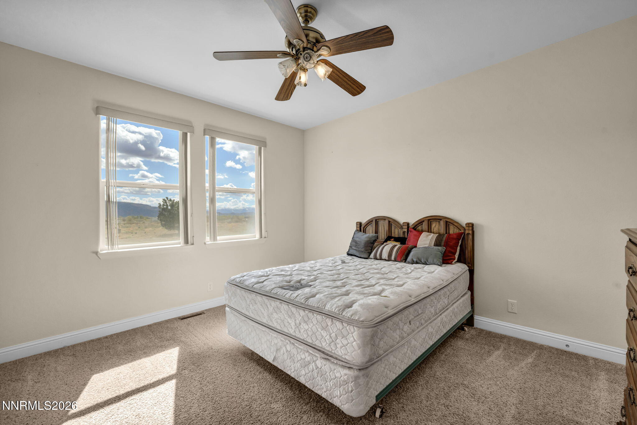 68 Kari Lane Smith Valley, NV 89430 - Photo 12 of 42 a bedroom with a bed and window