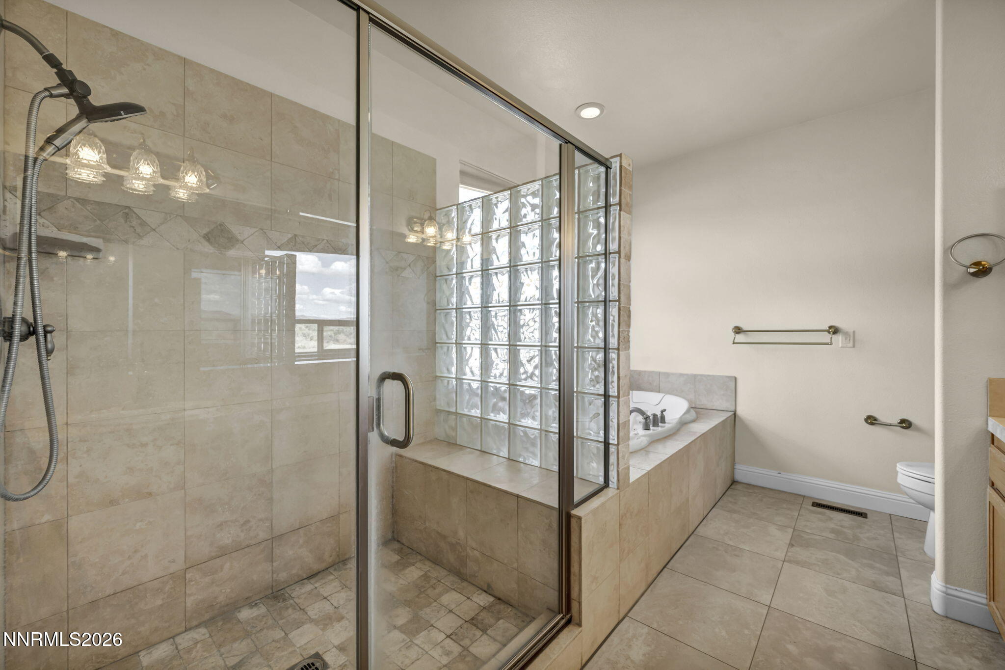 68 Kari Lane Smith Valley, NV 89430 - Photo 19 of 42 a bathroom with a tub shower and sink