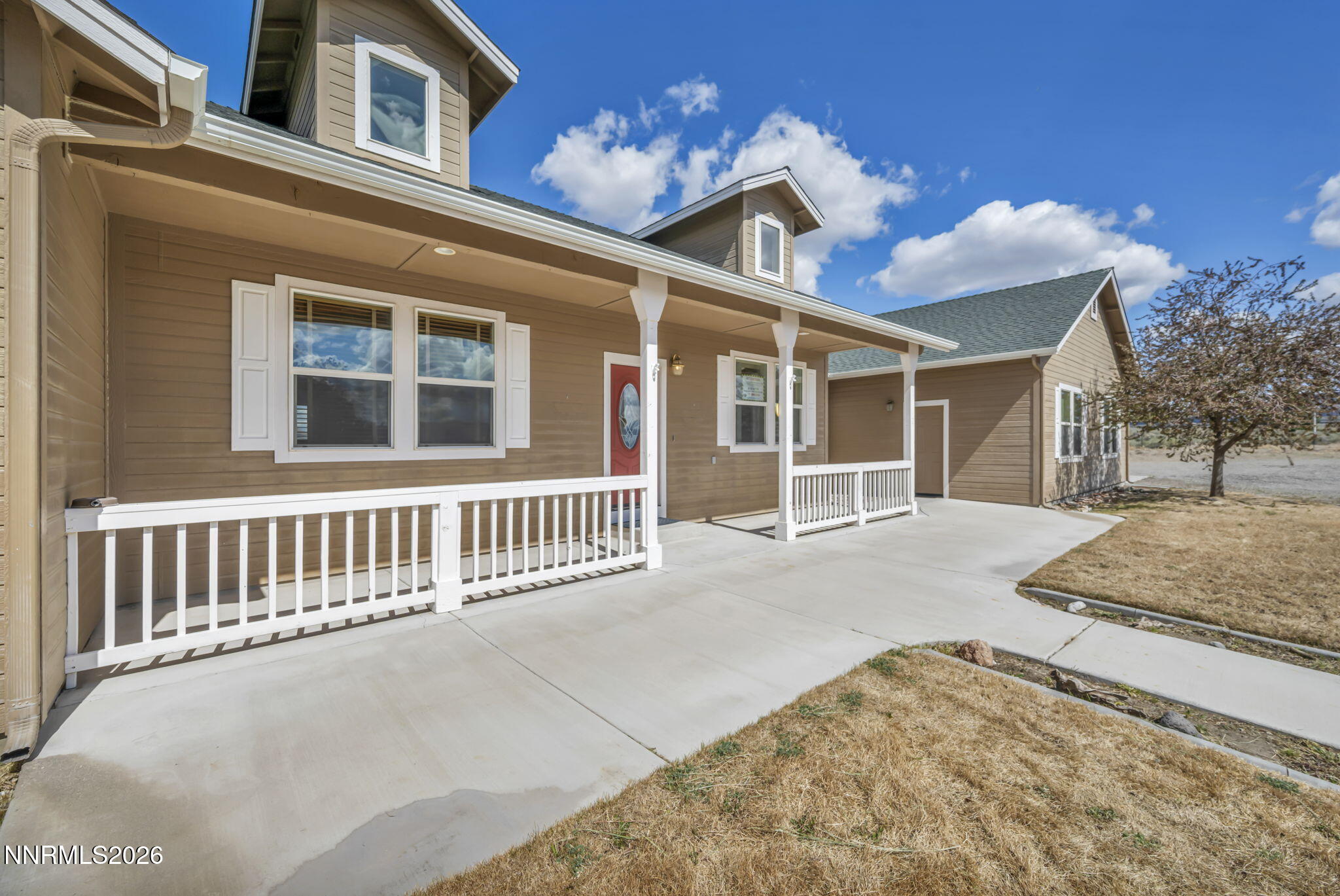 68 Kari Lane Smith Valley, NV 89430 - Photo 2 of 42 a view of a house with a porch