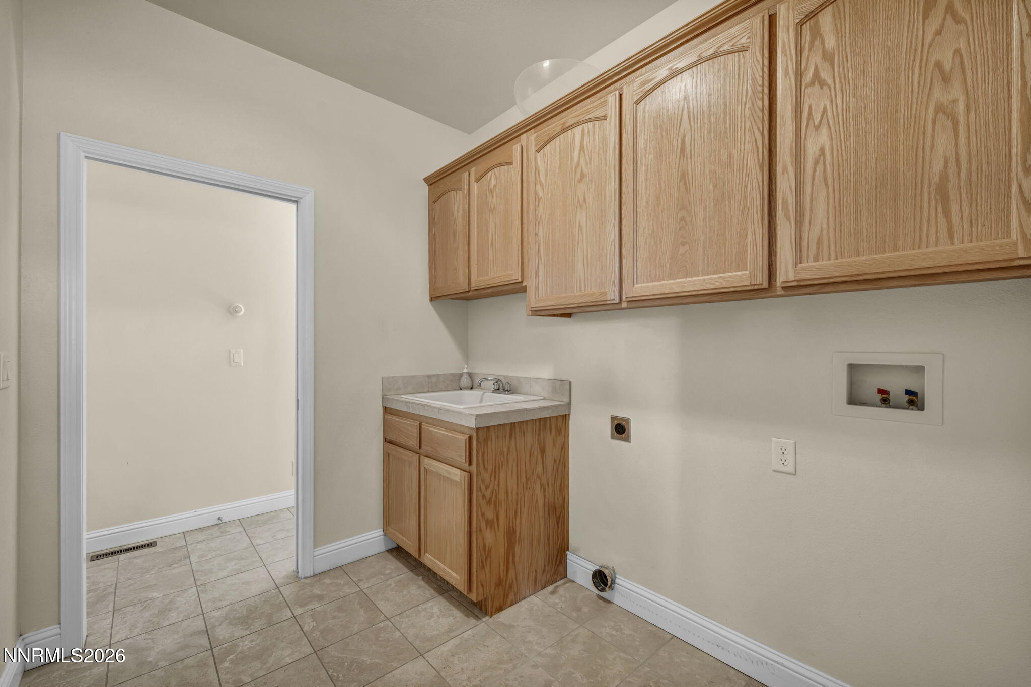 68 Kari Lane Smith Valley, NV 89430 - Photo 24 of 42 a view of cabinets with wooden floor and cabinet