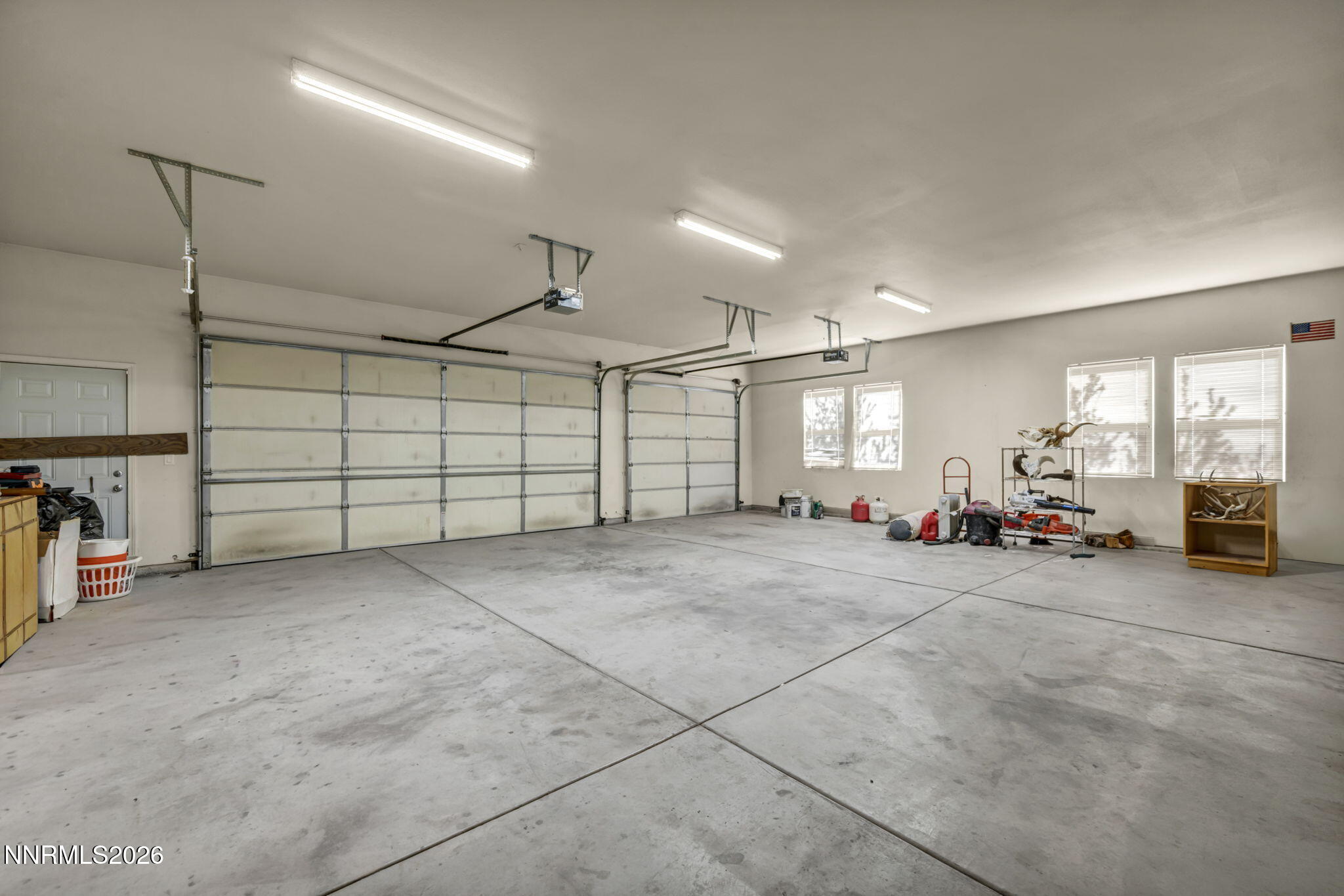 68 Kari Lane Smith Valley, NV 89430 - Photo 26 of 42 a view of a garage with furniture and a garage