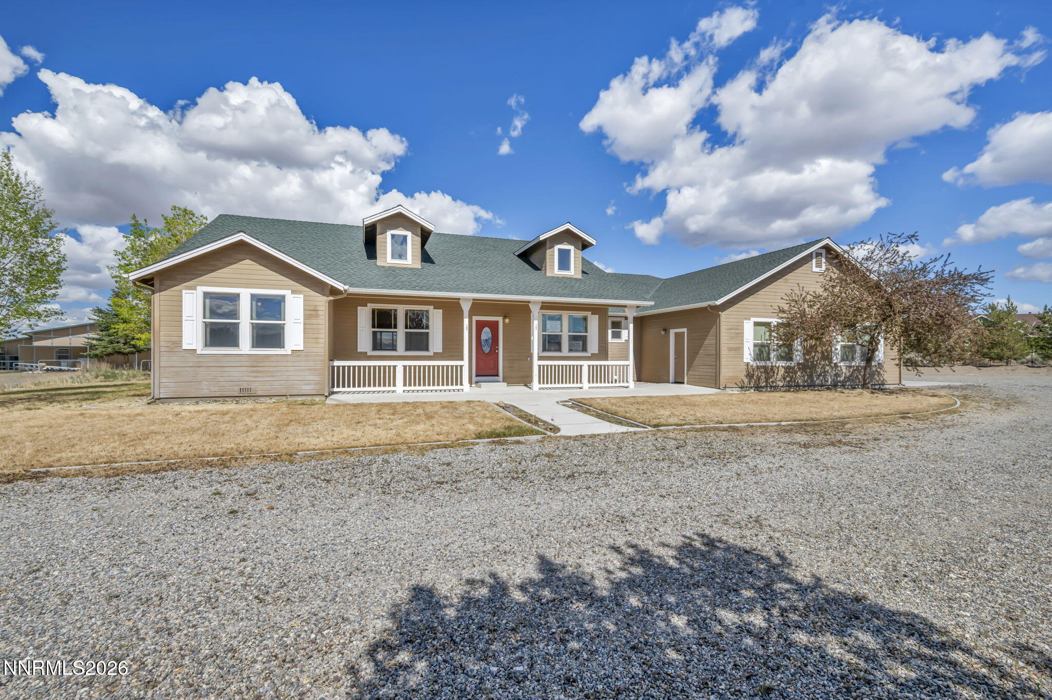 68 Kari Lane Smith Valley, NV 89430 - Photo 3 of 42 a view of a house with a yard