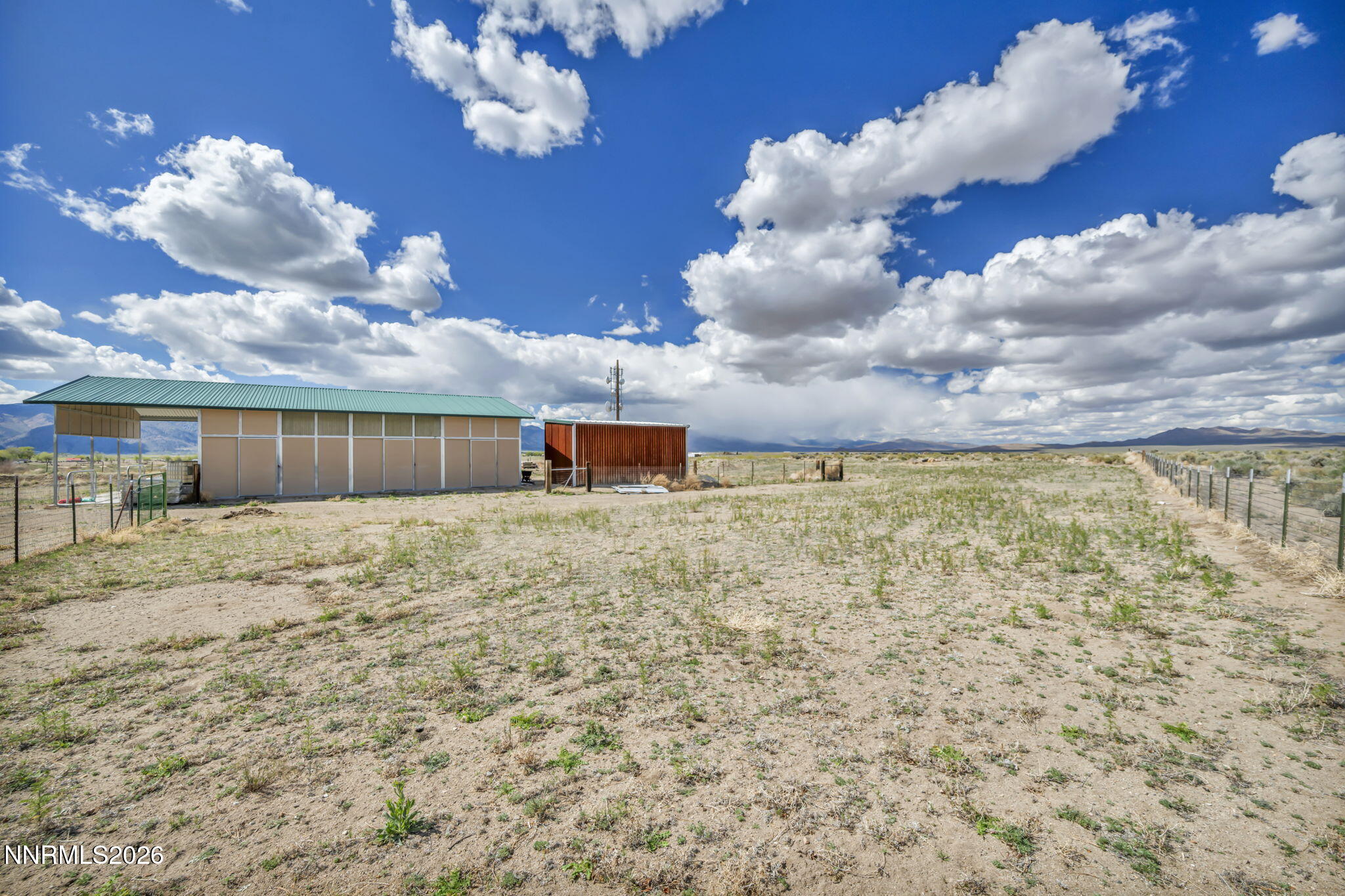 68 Kari Lane Smith Valley, NV 89430 - Photo 33 of 42 a front view of a house with a yard