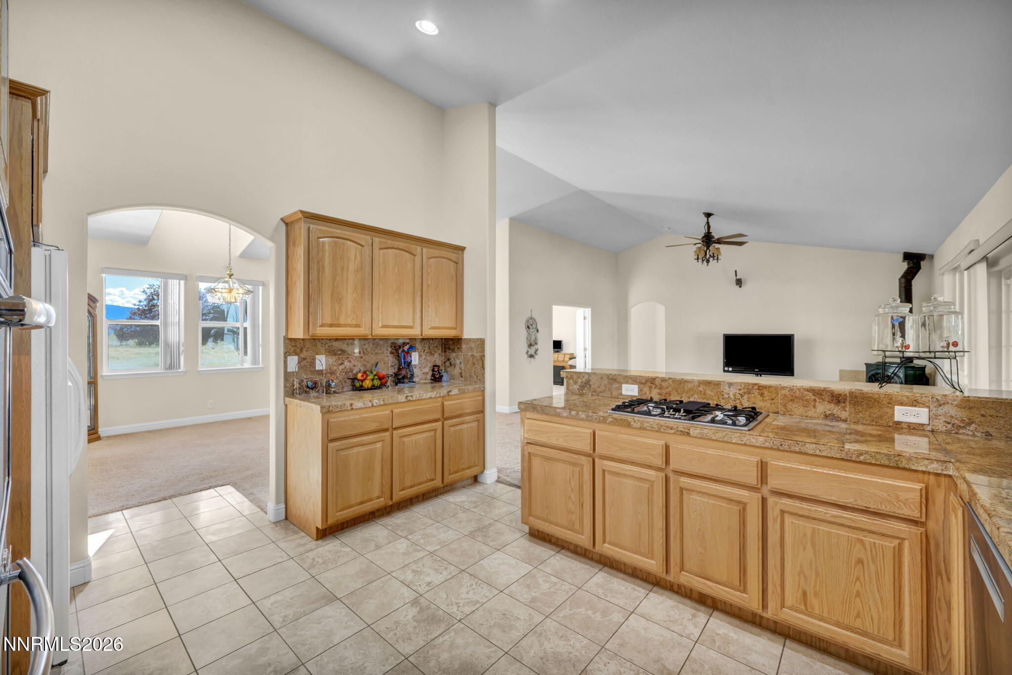 68 Kari Lane Smith Valley, NV 89430 - Photo 6 of 42 a kitchen with stainless steel appliances granite countertop a stove and a sink