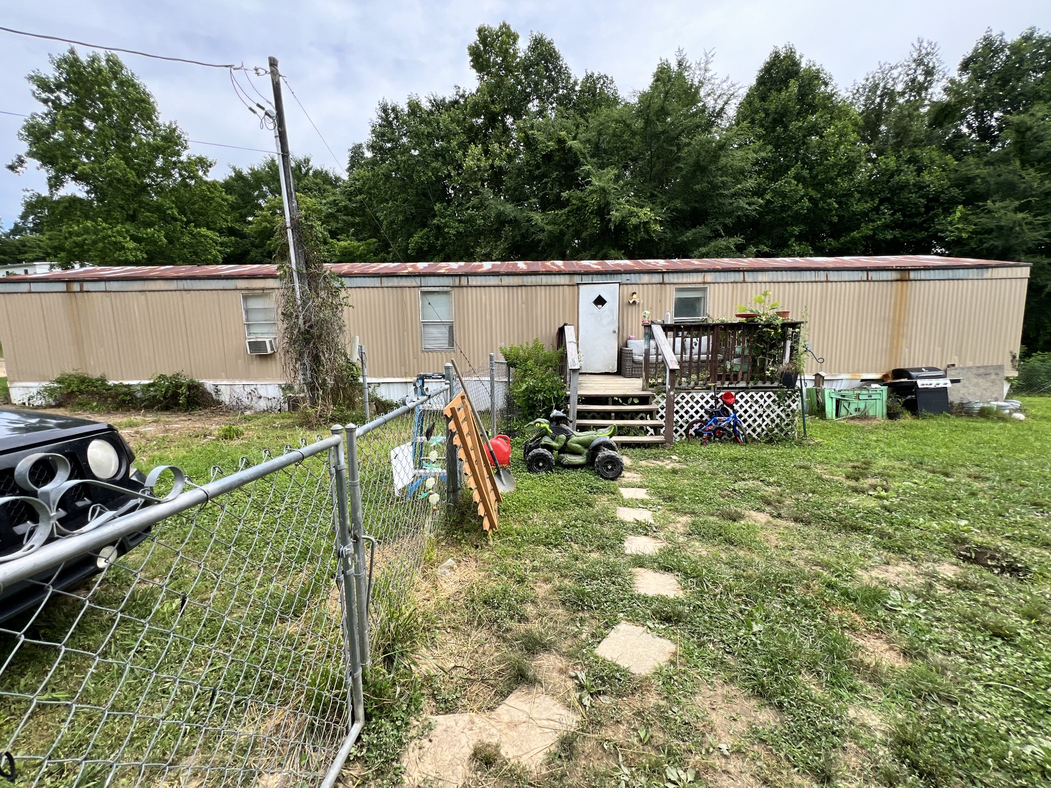 10338 Chappell Cemetery Road Bon Aqua, TN 37025 - Photo 6 of 21 a view of a backyard