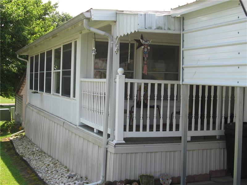 216 Edsel Drive Ruffs Dale, PA 15679 - Photo 3 of 17 Large Florida Room 12' x 24' with a deck