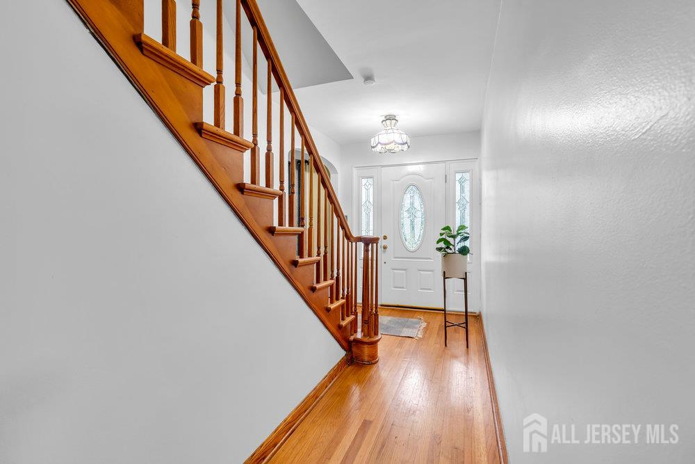 6 Carpender Road New Brunswick, NJ 08901 - Photo 4 of 30 a view of entryway with wooden floor